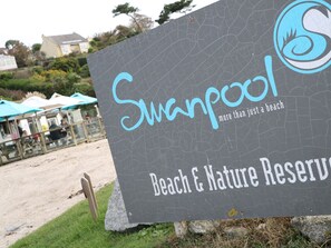 A sign for Swanpool Beach & Nature Reserve. - Primrose Cottage (Falmouth)