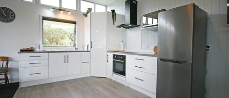 Fridge, microwave, toaster, cookware/dishes/utensils