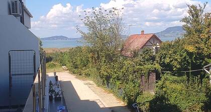 Holiday apartment with modern furnishings directly on the water, with air conditioning