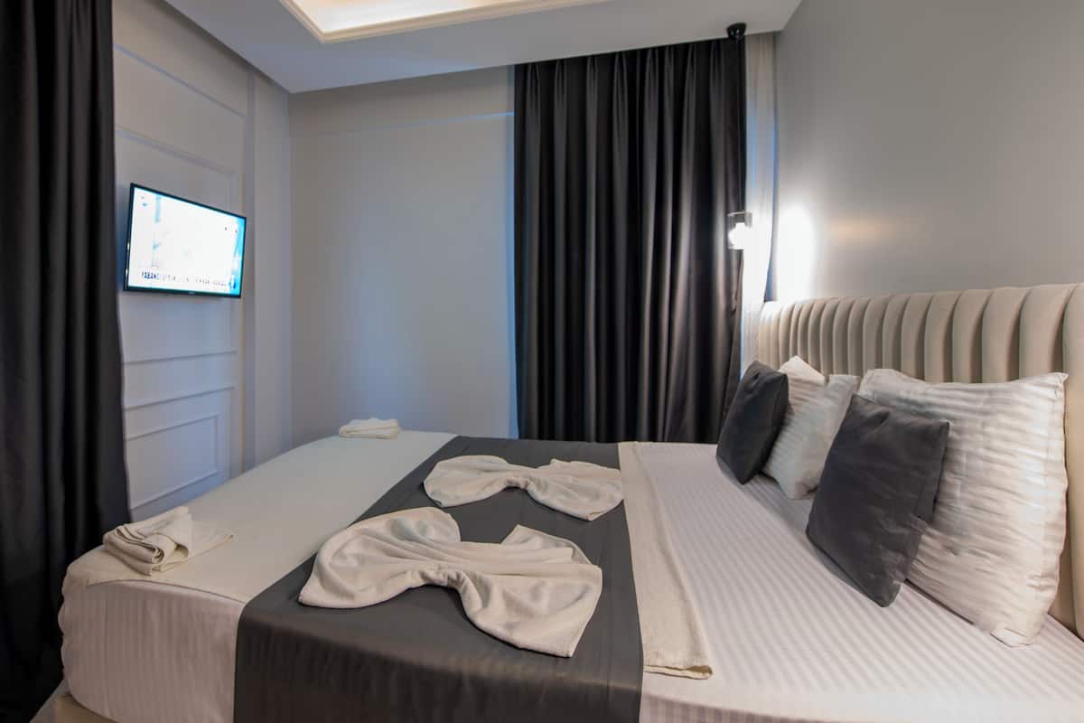 Economy enkelrum | Sängtillbehör av högsta kvalitet, minibar och skrivbord