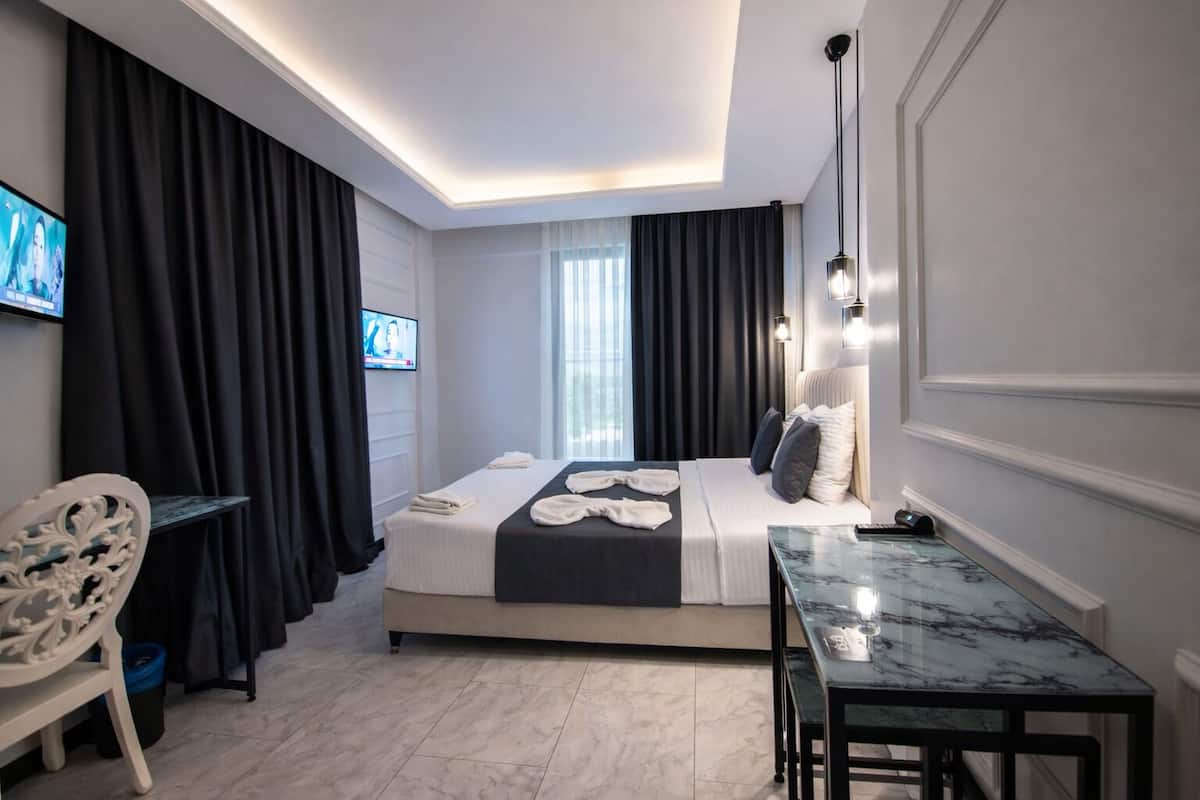 Premium bedding, minibar, desk, laptop workspace