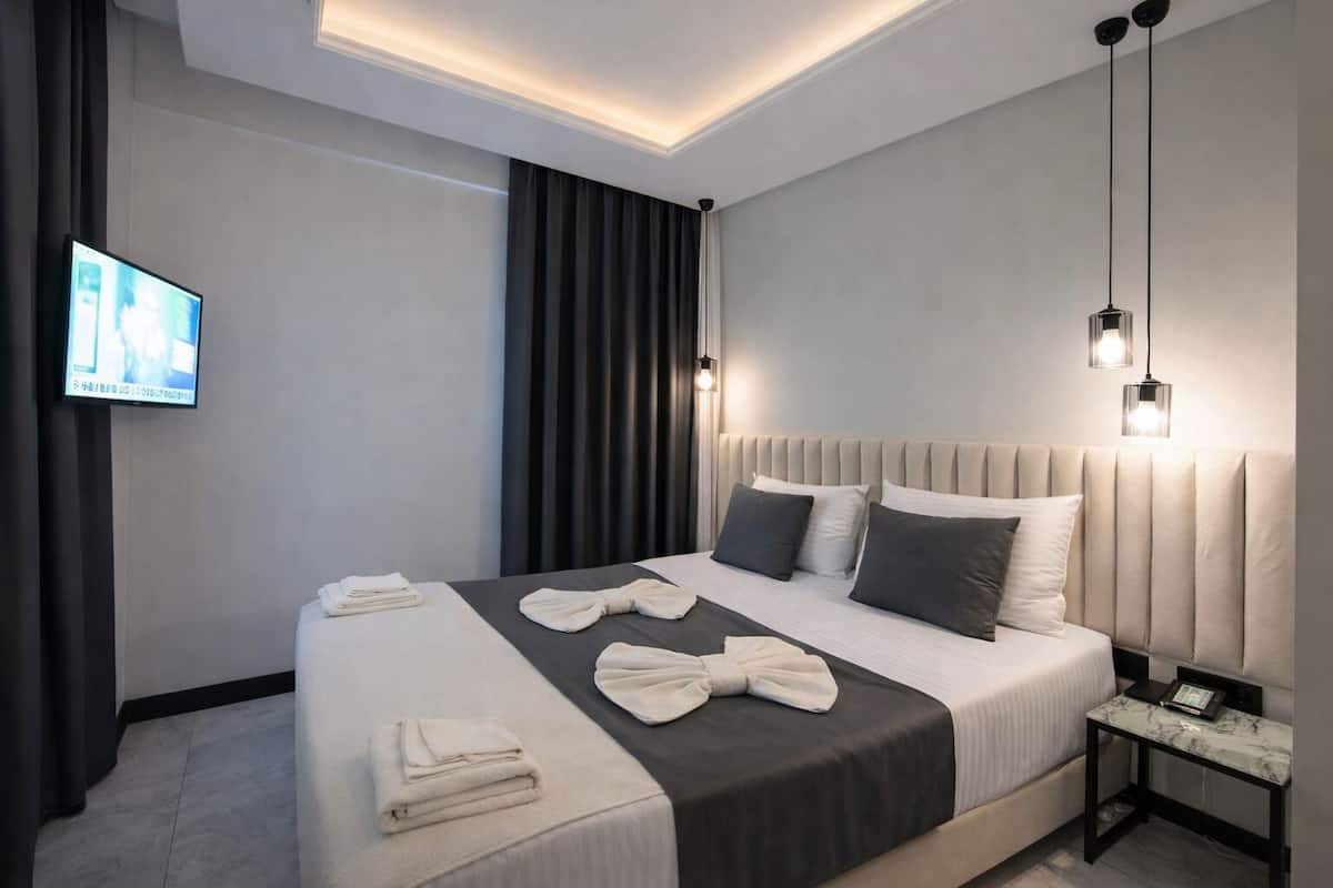 Premium bedding, minibar, desk, laptop workspace