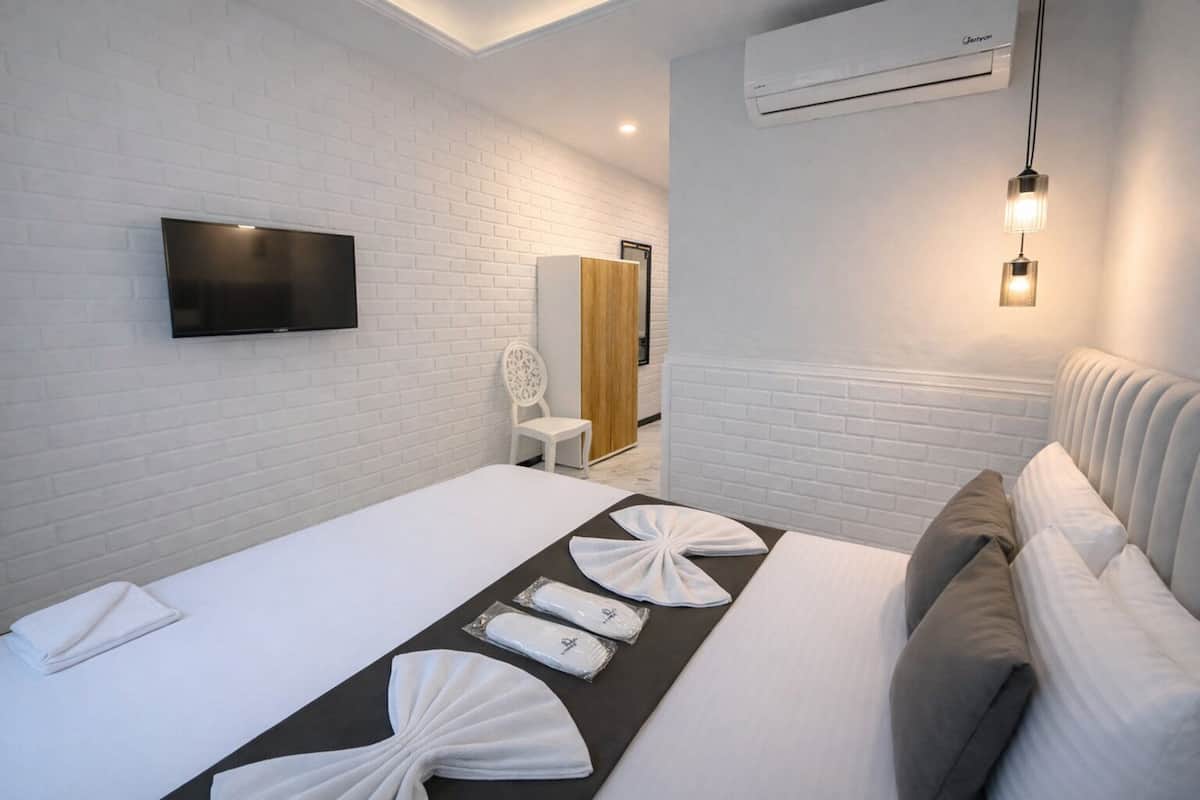 Familjerum | SÀngtillbehör av högsta kvalitet, minibar och skrivbord