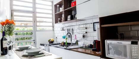 Villa | Private kitchen | Fridge, microwave, blender, cookware/dishes/utensils