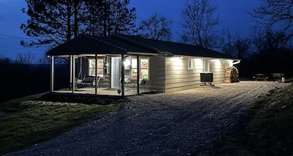 Renovated cottage w/incredible views of 54000 acres of public recreational land.