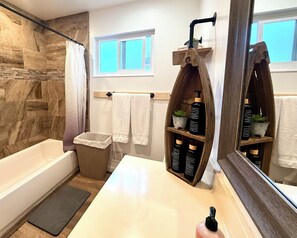 Hair dryer, towels, soap, toilet paper