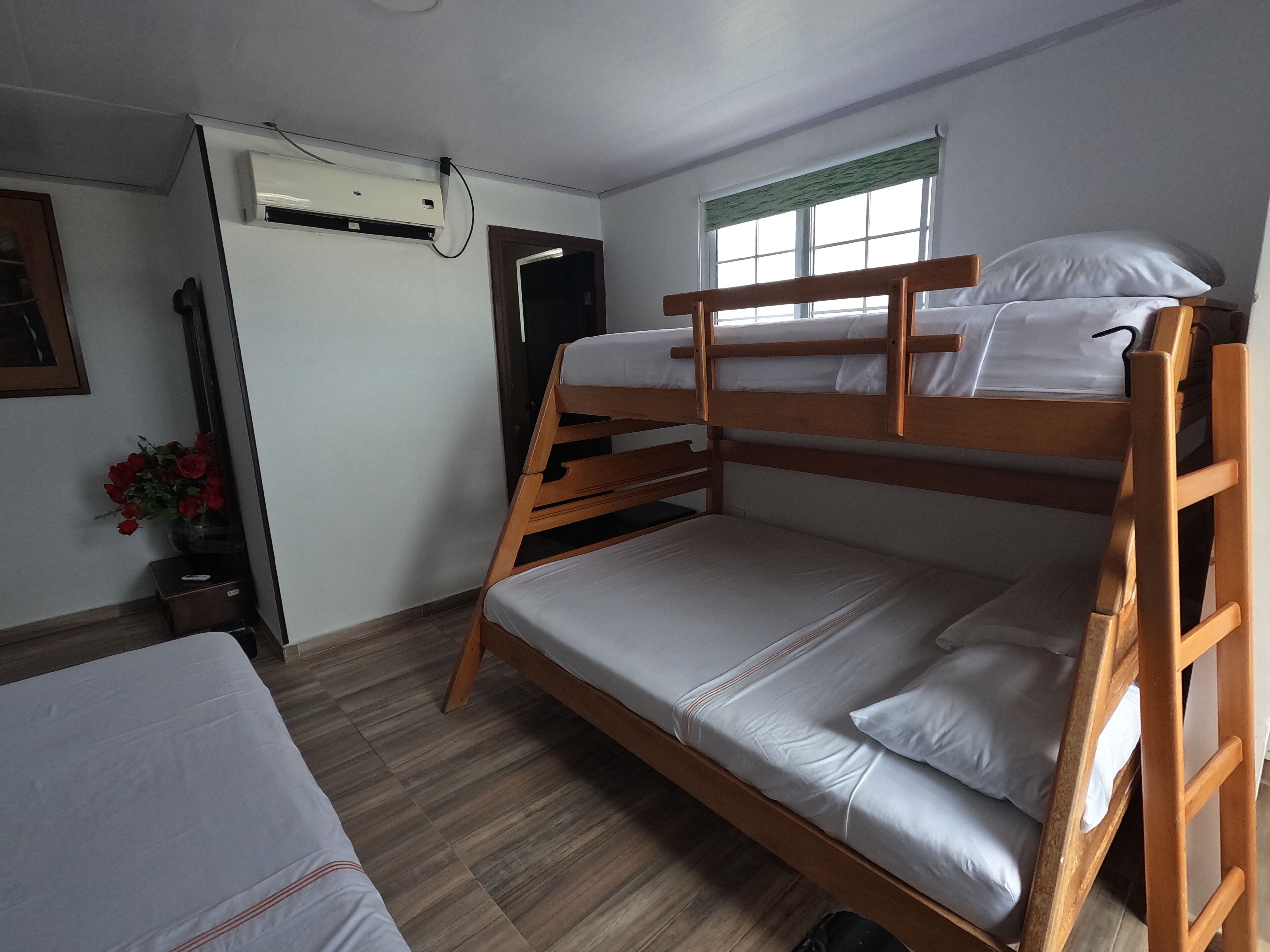 family room, multiple beds, ensuite | iron/ironing board, free wifi, bed sheets
