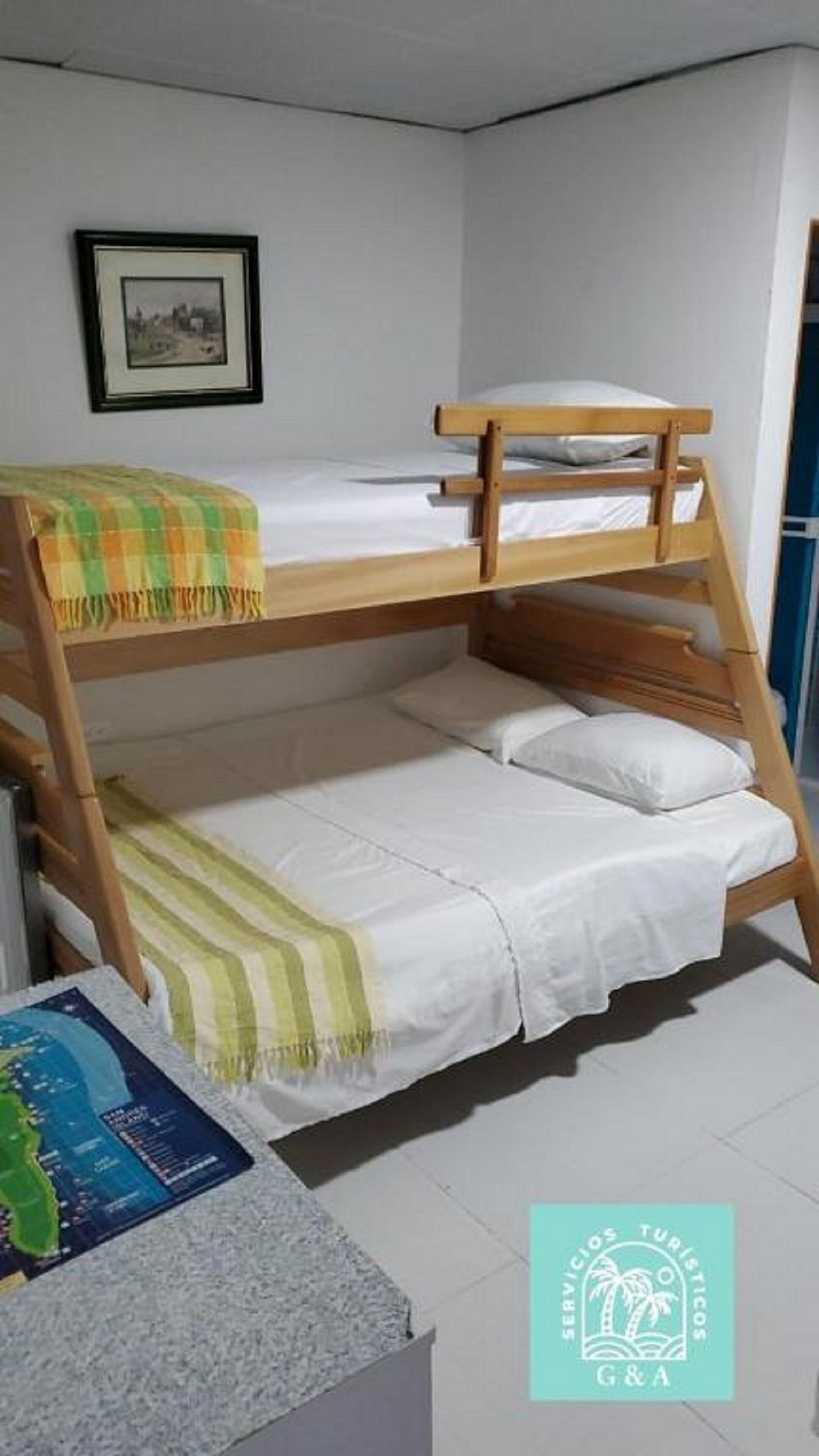 family room, multiple beds, ensuite | iron/ironing board, free wifi, bed sheets