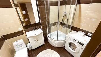 Hair dryer, towels, soap, shampoo