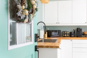 Fridge, microwave, coffee/tea maker, toaster