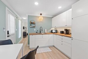 Fridge, microwave, coffee/tea maker, toaster