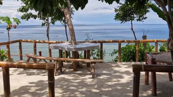Deluxe Room, Multiple Beds, Sea View | Terrace/patio