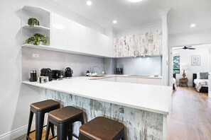 Fridge, microwave, oven, stovetop - Trinity Links Resort- Luxury Tropical Retreat with Pools, Spa & Golf Course Views (White Rock)