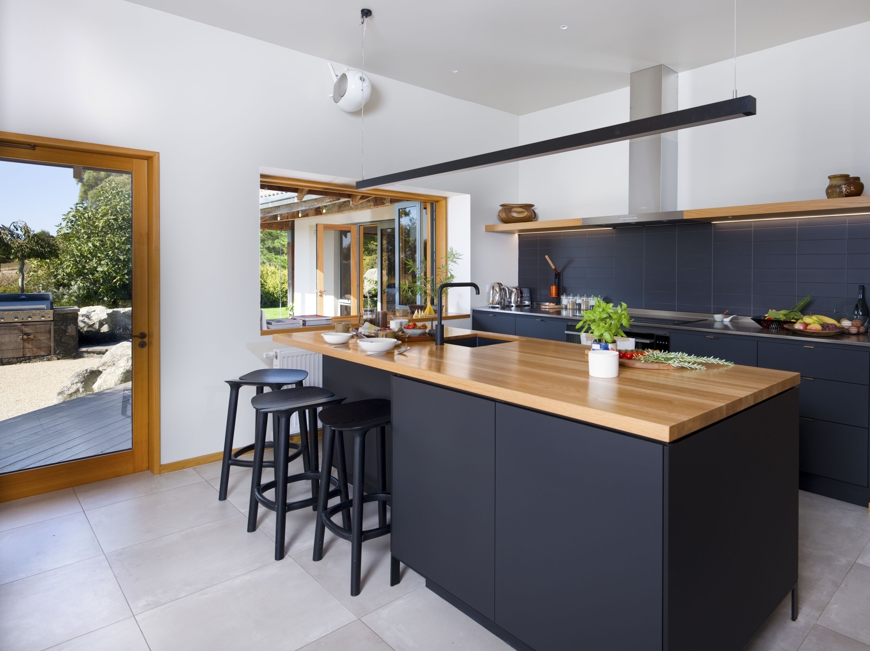 Deluxe House | Private kitchen | Dining tables