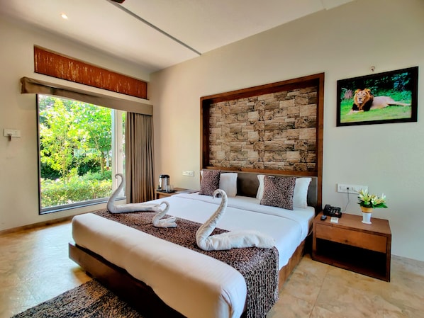 Deluxe Double Room, 1 Double Bed | Iron/ironing board, bed sheets - Lion Signature Family Resort (Talala)