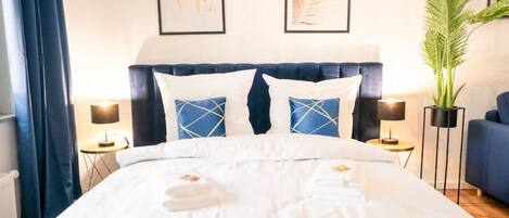 1 bedroom, desk, iron/ironing board, travel crib