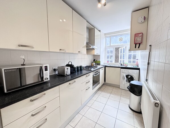 Apartment, Multiple Beds | Private kitchen