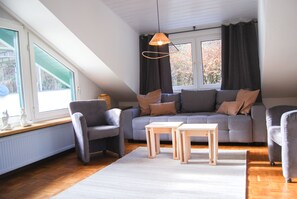 Standard Condo | Living area | 32-inch flat-screen TV with digital channels, Netflix