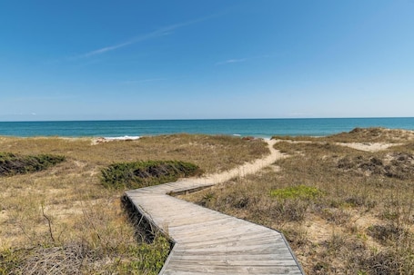 Beach nearby. Paradise By The Sea at Villas of Hatteras Landing - 1 Bedroom Near-Beach Condos with Pool Access