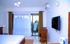 Executive Double Room | Premium bedding, minibar, individually decorated, desk - Greenyard Beach Hotel (Entebbe)