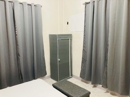 Premium Room | Individually furnished, desk, free WiFi, bed sheets. Olympia Travellers Inn