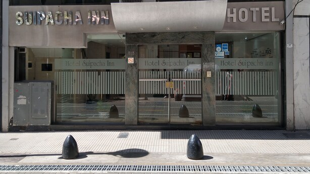 A hotel entrance with a large sign reading "SUIPACHA INN HOTEL". - SUIPACHA INN HOTEL (Buenos Aires)