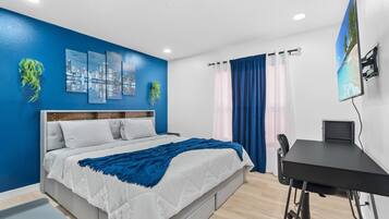 2 chambres, coffres-forts dans les chambres, fer et planche à repasser