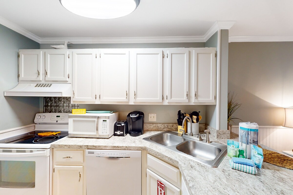 Photo 9 of Dog-friendly charming beach condo with pool, hot tub, sauna, deck & water access