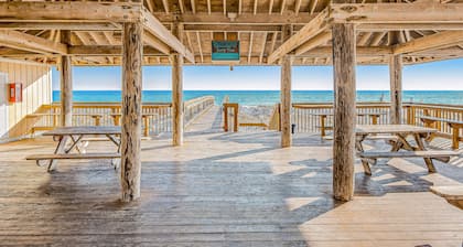 Dog-friendly charming beach condo with pool, hot tub, sauna, deck & water access