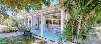 Enchanting dog-friendly beach bungalow with patio, fireplace, deck, AC, & W/D