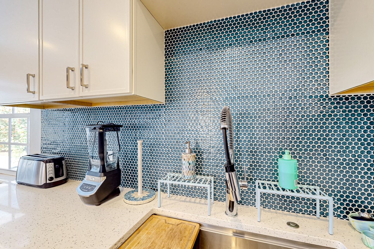 Photo 10 of Enchanting dog-friendly beach bungalow with patio, fireplace, deck, AC, & W/D