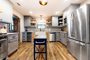 Fridge, microwave, oven, stovetop - Spacious dog-friendly home settled on a serene property with wrap-around porch (Wimberley)