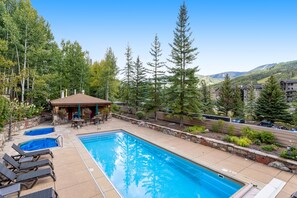 Pool - Sunlit, mountain view condo with a fireplace plus on-site pool & hot tub (Vail)