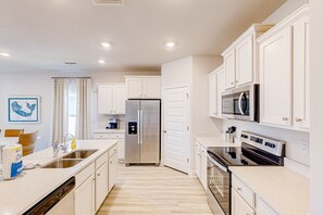 Fridge, microwave, oven, stovetop - Windmark home with mother-in-law suite, pool access, washer/dryer, and AC (Port St. Joe)