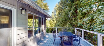 Dog-friendly home with large yard, inviting deck & spacious layout