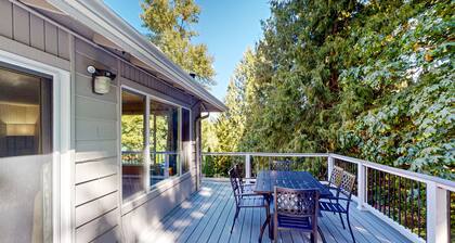 Dog-friendly home with large yard, inviting deck & spacious layout