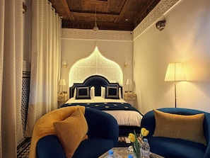 Deluxe Suite, 1 Bedroom, Non Smoking, Courtyard View | 4 bedrooms, individually decorated, individually furnished