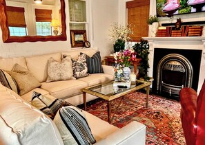 Smart TV, fireplace, books, offices