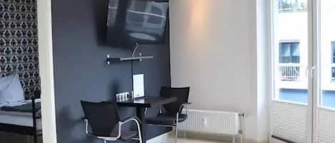 Lägenhet Comfort | Vardagsrum | 40-tums LCD-tv med satellitkanaler