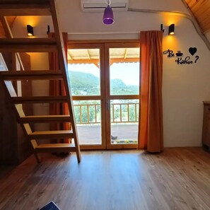 Elite-Baumhaus, 1 Schlafzimmer, Meerblick | Wohnbereich