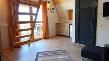 Elite-Baumhaus, 1 Schlafzimmer, Meerblick | Wohnbereich