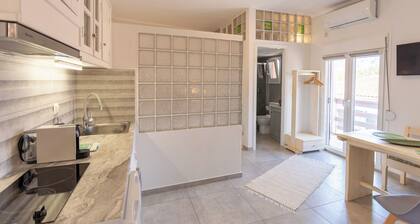 Eressian Lodgings | Cozy Central Studio Steps from the Beach