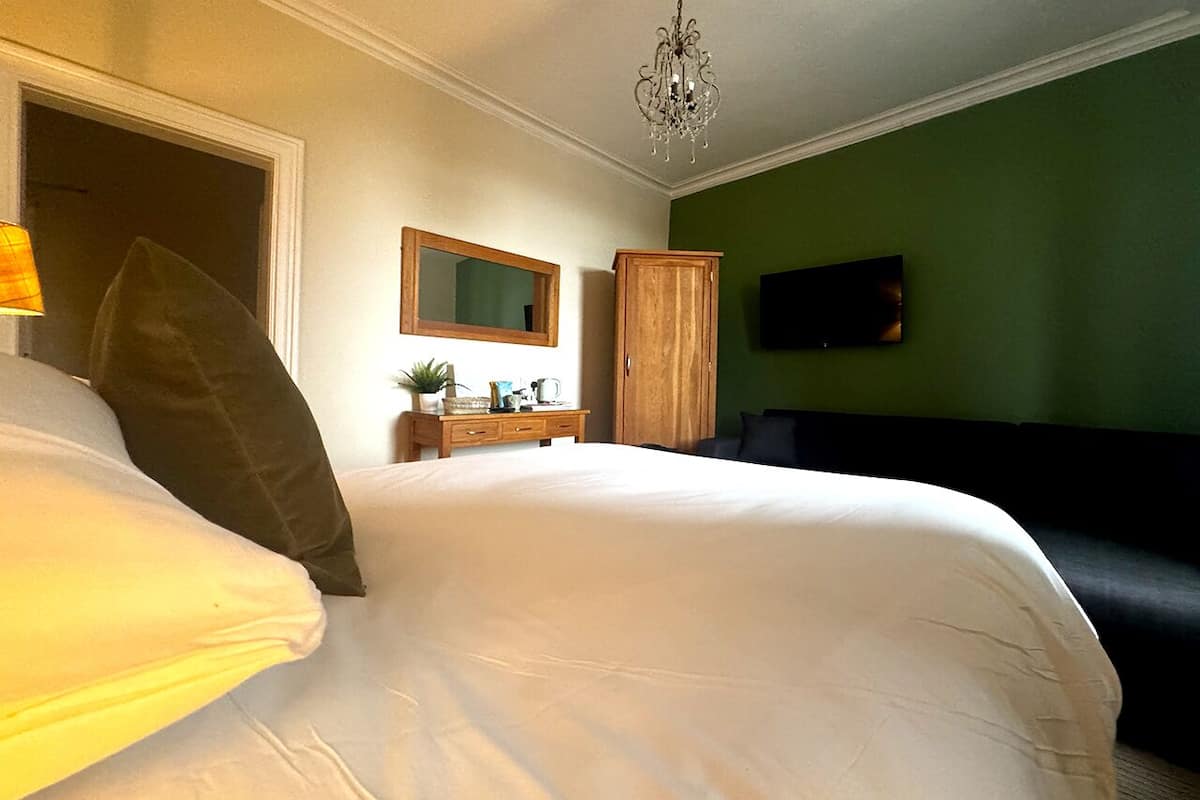 Family Room | Premium bedding, pillow-top beds, desk, laptop workspace