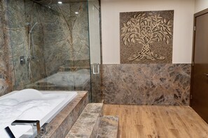 Jetted tub, free toiletries, hair dryer, bathrobes