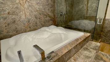 Jetted tub, free toiletries, hair dryer, bathrobes