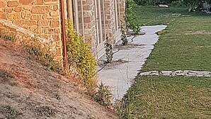A stone building with a sloped roof and a small porch. - TERRALUNA - Holiday home surrounded by the greenery of San Leo, San Marino and Montefeltro (San Leo)