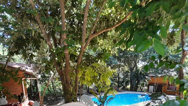 2 outdoor pools, open 7:00 AM to 10:00 PM, pool loungers - Hotel Cabinas La Playa (Veintisiete de Abril)
