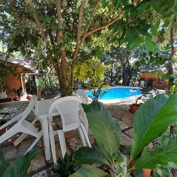 2 outdoor pools, open 7:00 AM to 10:00 PM, pool loungers - Hotel Cabinas La Playa (Veintisiete de Abril)