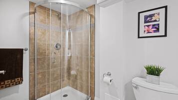 Shower, hair dryer, towels, soap