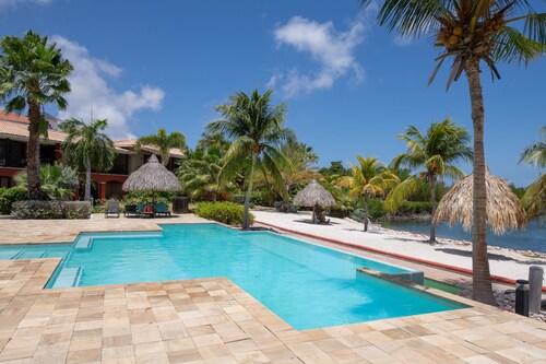 Just at the frontline of Spanish Water in a beautiful resort